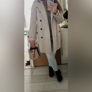 Light beige Burberry Trench Coat